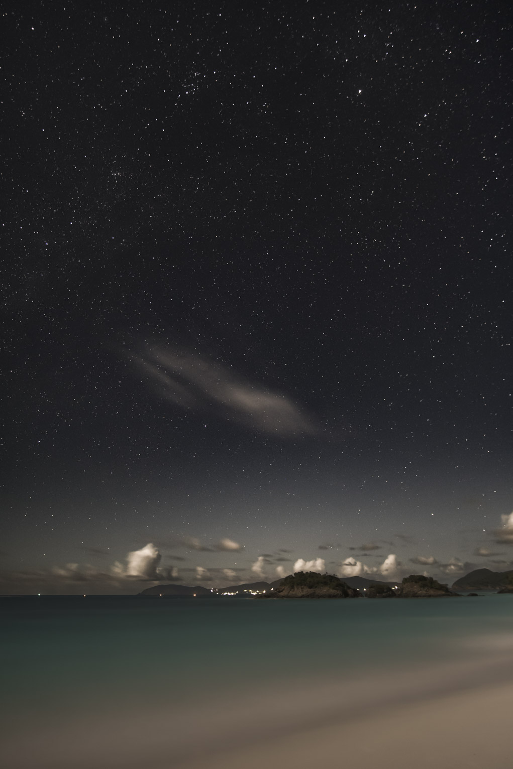 Stars over the sand and the bay